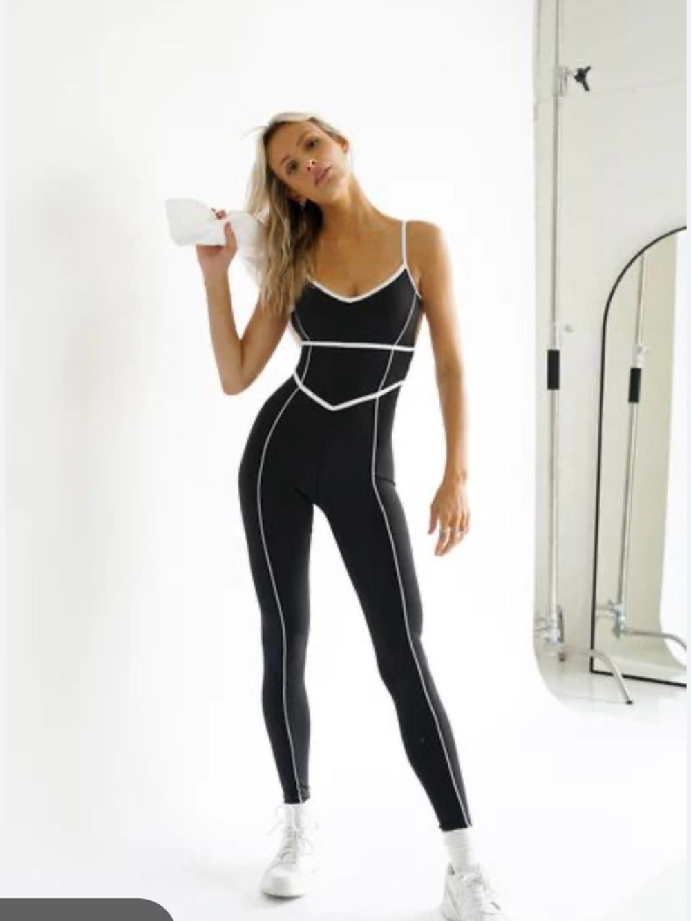 Yellow the Label black athletic jumpsuit white trim